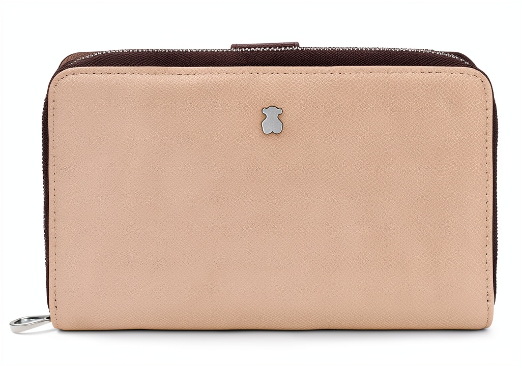 Tous Damen-Geldbörse in Beige auf einem Tisch liegend